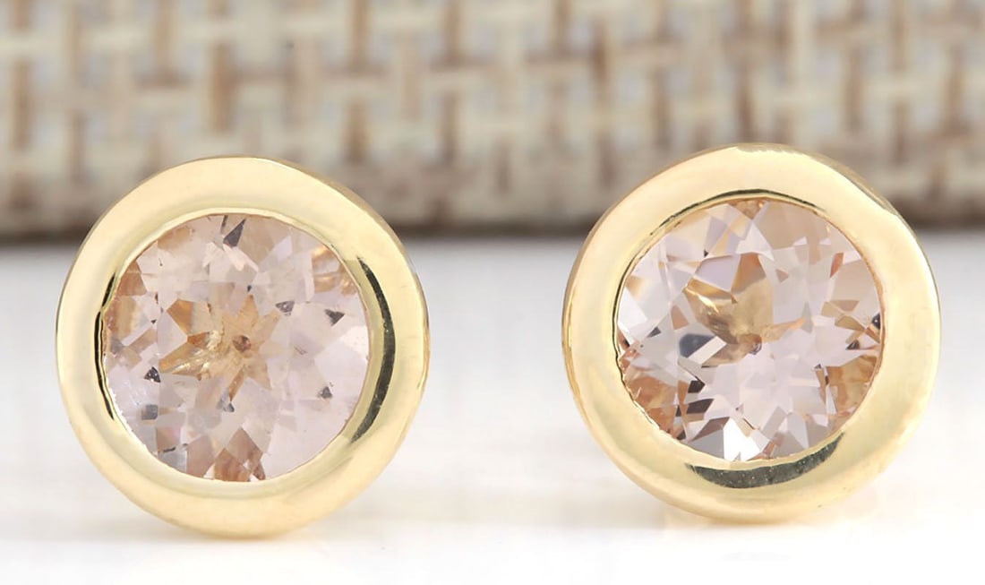 3.00 Carat Morganite 18K Yellow Gold Earrings: 3.00 Carat Morganite 18K Yellow Gold Earrings Stamped: 18K Total Earring Weight: 1.7Grams Gemstone Weight: Total Natural Morganite Weight is 3.00ctw (Measures: 6.00mm) Face Measure: 9.03mm SKU: [70332