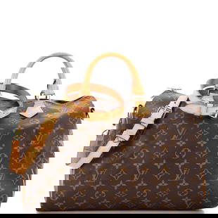 Louis Vuitton Speedy Bandouliere Bag Monogram Canvas 35: Louis Vuitton Speedy Bandouliere Bag Monogram Canvas 35 ---- Exterior Color: Brown ---- Interior Color: Brown ---- Exterior Material: Canvas Coated ---- Interior Material: Fabric ---- Hardware Color: