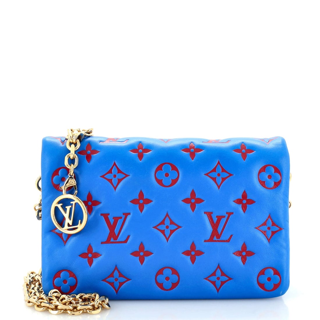 Louis Vuitton Coussin Pochette Monogram Embossed Lambskin: Louis Vuitton Coussin Pochette Monogram Embossed Lambskin ---- Exterior Color: Blue ---- Interior Color: Red ---- Exterior Material: Leather ---- Interior Material: Microfiber ---- Hardware Color: Gol