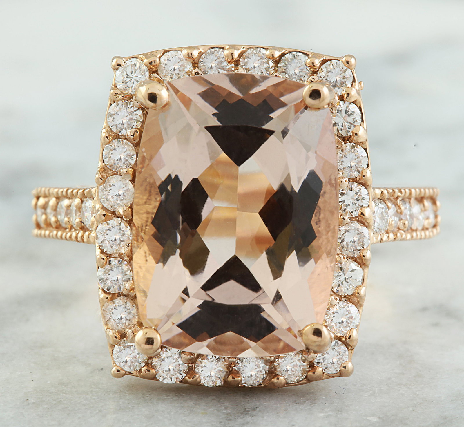 7.12 Carat Morganite 18K Rose Gold Diamond Ring: 7.12 Carat Morganite 18K Rose Gold Diamond Ring Stamped: 18K Total Ring Weight: 5.7 Grams Morganite Weight: 6.32 Carat (7.60x7.50 Millimeters) Diamond Weight: 0.80 Carat (F-G Color, VS2-SI1 Clarity )