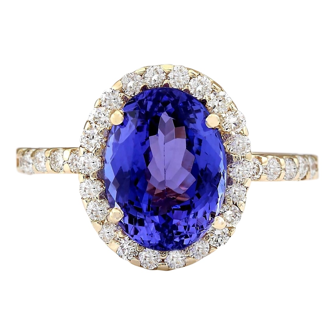 4.30 Carat Tanzanite 14K Yellow Gold Diamond Ring: 4.30 Carat Tanzanite 14K Yellow Gold Diamond Ring Stamped: 14K Yellow Gold Total Ring Weight: 3.7 Grams Ring Length: N/A Ring Width: N/A Gemstone Weight: Total Natural Tanzanite Weight is 3.70 Carat (