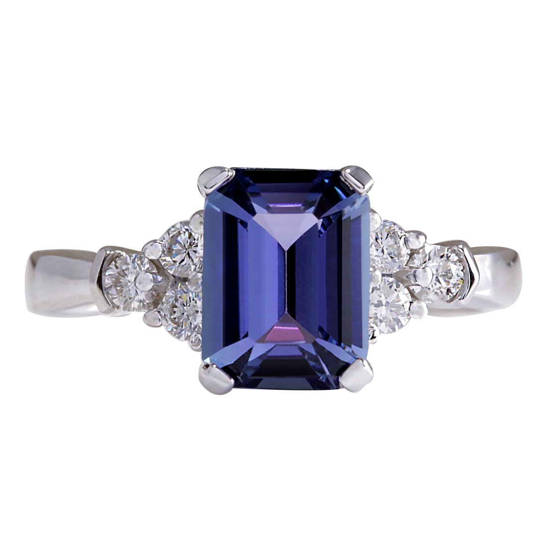 2.40 Carat Tanzanite 18K White Gold Diamond Ring: 2.40 Carat Tanzanite 18K White Gold Diamond Ring Stamped: 18K White Gold Total Ring Weight: 3.5 Grams Ring Length: N/A Ring Width: N/A Gemstone Weight: Total Natural Tanzanite Weight is 2.10 Carat (Me