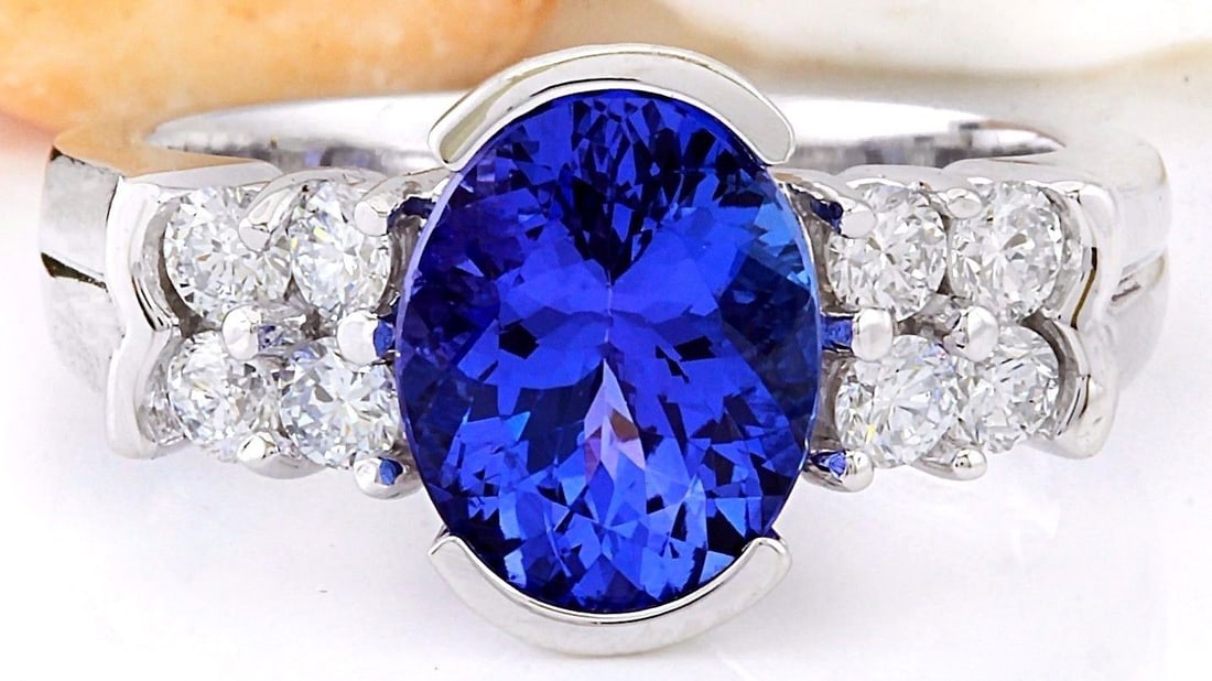 3.28 Carat Natural Tanzanite 18K Solid White Gold Diamond Ring: 3.28 Carat Natural Tanzanite 18K Solid White Gold Diamond Ring 3.28 Carat Natural Tanzanite 18K Solid White Gold Diamond RingItem Type: RingItem Style: EngagementMaterial: 18K White GoldMainstone: Tan