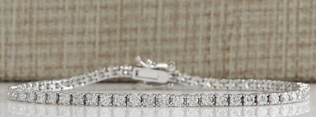 3.55 Carat Natural Diamond Bracelet In 14K Solid White Gold: 3.55 Carat Natural Diamond Bracelet In 14K Solid White Gold Stamped: 14K Bracelet Width: 2.75mm Bracelet Length: 7.5 Inches Total Bracelet Weight: 7.8 Grams Diamond Weight: Total natural diamond weigh