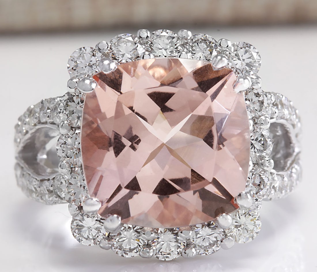 8.66Carat Natural Peach Morganite And Diamond Ring In 18K Solid White Gold: 8.66Carat Natural Peach Morganite And Diamond Ring In 18K Solid White Gold Stamped: 18K Ring Size: 6 Total Ring Weight: 9.8 Grams Diamond Weight: Total natural diamond weight is 2.55carat. VS2-SI1 cla