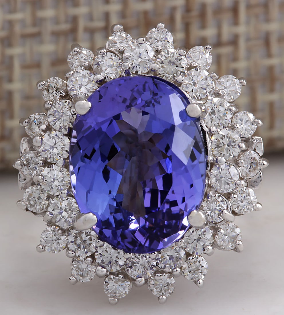 7.13 Carat Tanzanite 18K White Gold Diamond Ring: 7.13 Carat Tanzanite 18K White Gold Diamond Ring Stamped: 18K Ring Size: 6 Total Ring Weight: 6.2 Grams Diamond Weight: Total natural diamond weight is 1.38carat. VS2-SI1 clarity / F-G color Gemstone 