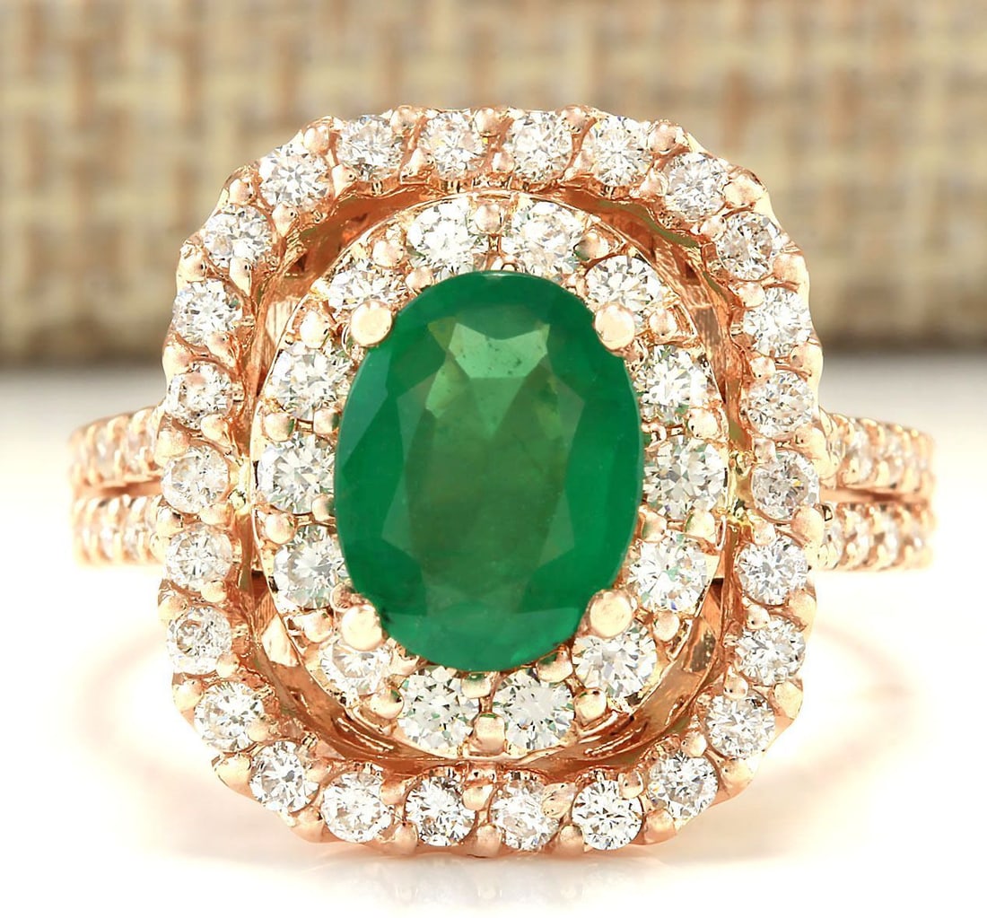 2.41 Carat Natural Emerald And Diamond Ring In 18K Rose Gold: 2.41 Carat Natural Emerald And Diamond Ring In 18K Rose Gold Stamped: 18K Ring Size: 6.75 Total Ring Weight: 6.6 Grams Diamond Weight: Total natural diamond weight is 1.00carat. VS2-SI1 clarity / G-H 