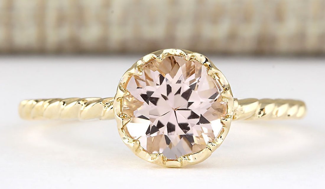 1.20 Carat Natural Morganite Ring In 14k Yellow Gold: 1.20 Carat Natural Morganite Ring In 14k Yellow Gold Stamped: 14K Ring Size: 6.75 Total Ring Weight: 1 Grams Gemstone Weight: Total Natural Morganite Weight is 1.20ctw Main Stone Color: Peach Face Mea