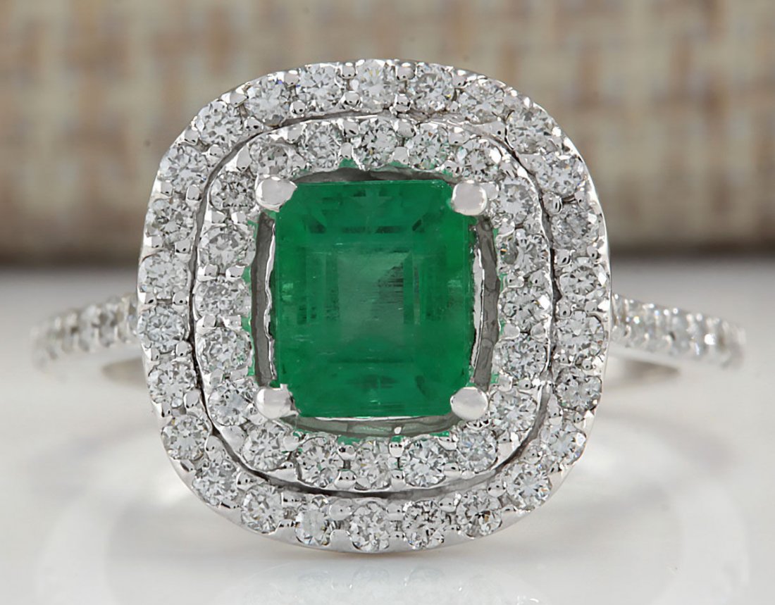 2.00CTW Natural Colombian Emerald And Diamond Ring In: Stamped: 14K Ring Size: 5.5 Total Ring Weight: 3.6 Grams Diamond Weight: Total natural diamond weight is 1.00carat. SI1-SI2 clarity / G-H color Gemstone Weight: Total Natural Emerald Weight is 1.00ctw
