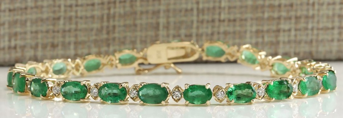 8.86CTW Natural Colombian Emerald And Diamond Bracelet: Stamped: 14K Bracelet Width: 4.63mm Bracelet Length: 7.4 Inches Total Bracelet Weight: 8.5 Grams Diamond Weight: Total natural diamond weight is .60carat. SI1-SI2 clarity / G-H color Gemstone Weight: 