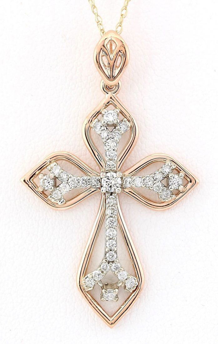 .70 CTW Natural Diamond Pendant In 14k Solid Rose Gold: Stamped: 14K Total Pendant Weight: 4.4Grams Diamond Weight: Total natural diamond weight is .70carat. SI1-SI2 clarity / G-H color Face Measures: 36.39x25.68mm SKU: [704114]