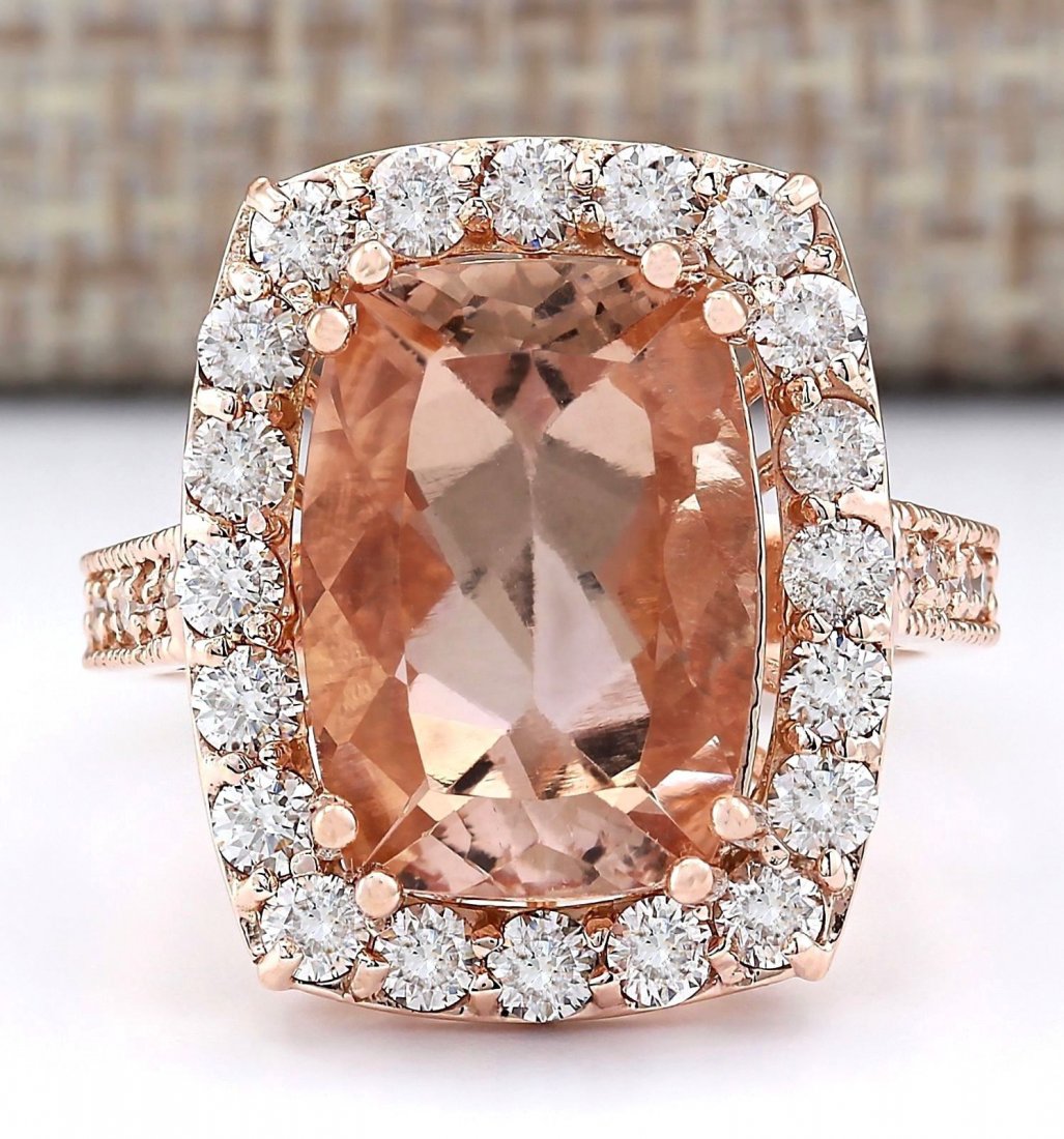 8.31 CTW Natural Morganite And Diamond Ring In 14k Rose: Stamped: 14K Ring Size: 7 Total Ring Weight: 8.1 Grams Diamond Weight: Total natural diamond weight is 1.30carat. SI1-SI2 clarity / G-H color Gemstone Weight: Total Natural Morganite Weight is 7.01ctw