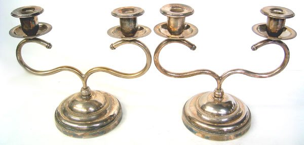 silver plated metal candelabras: Used pair of silver plated metal candelabras. 8" High & 9" Span