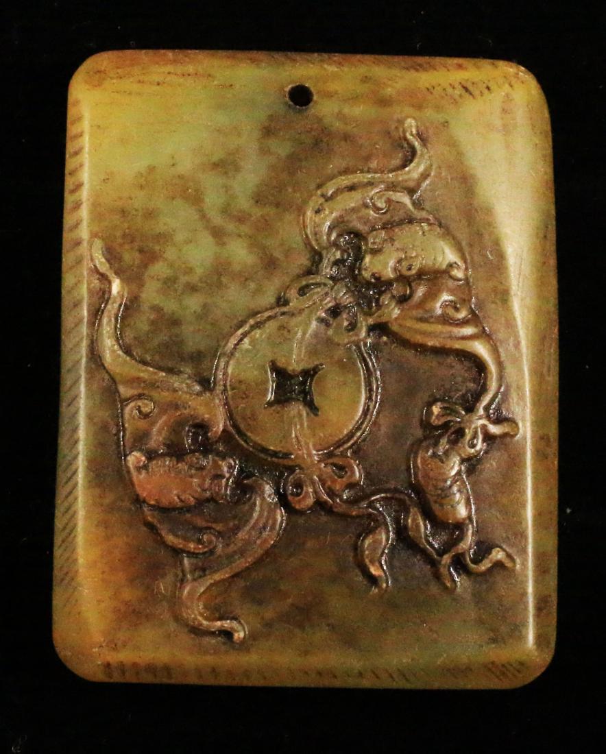 Handcarved jade plaque with amulet and flowers. 1920 . (1 of 2)
