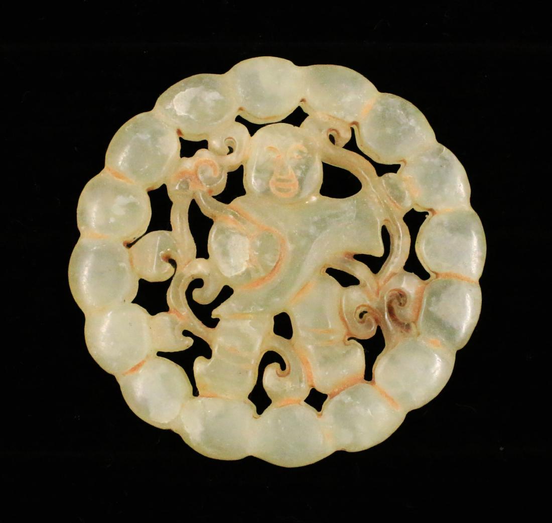 Handcarved Pendant Jade in round shape. 21 gr. (1 of 2)