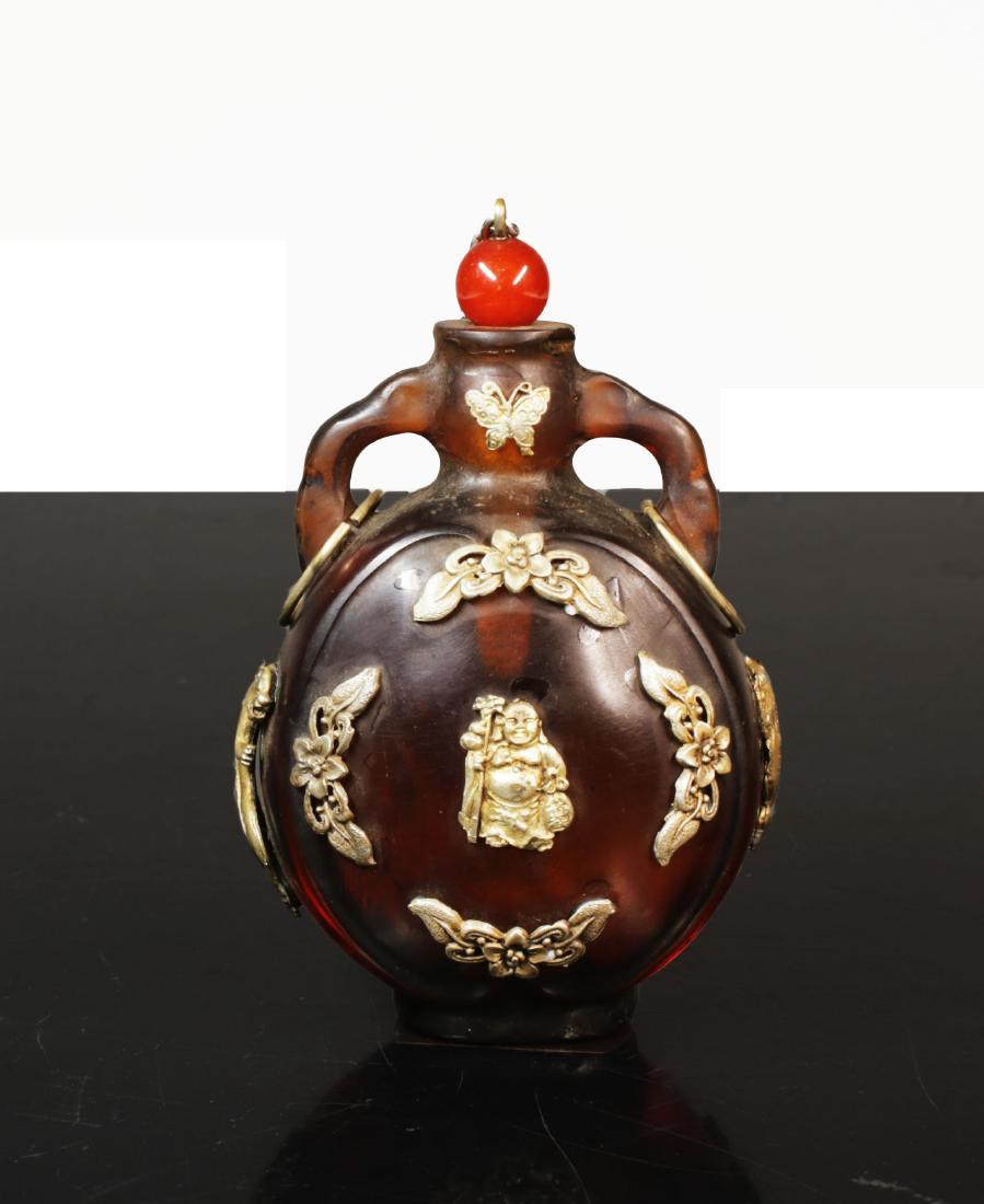Min Guo period. 1920 circa. Amber glass snuff bottle (1 of 6)