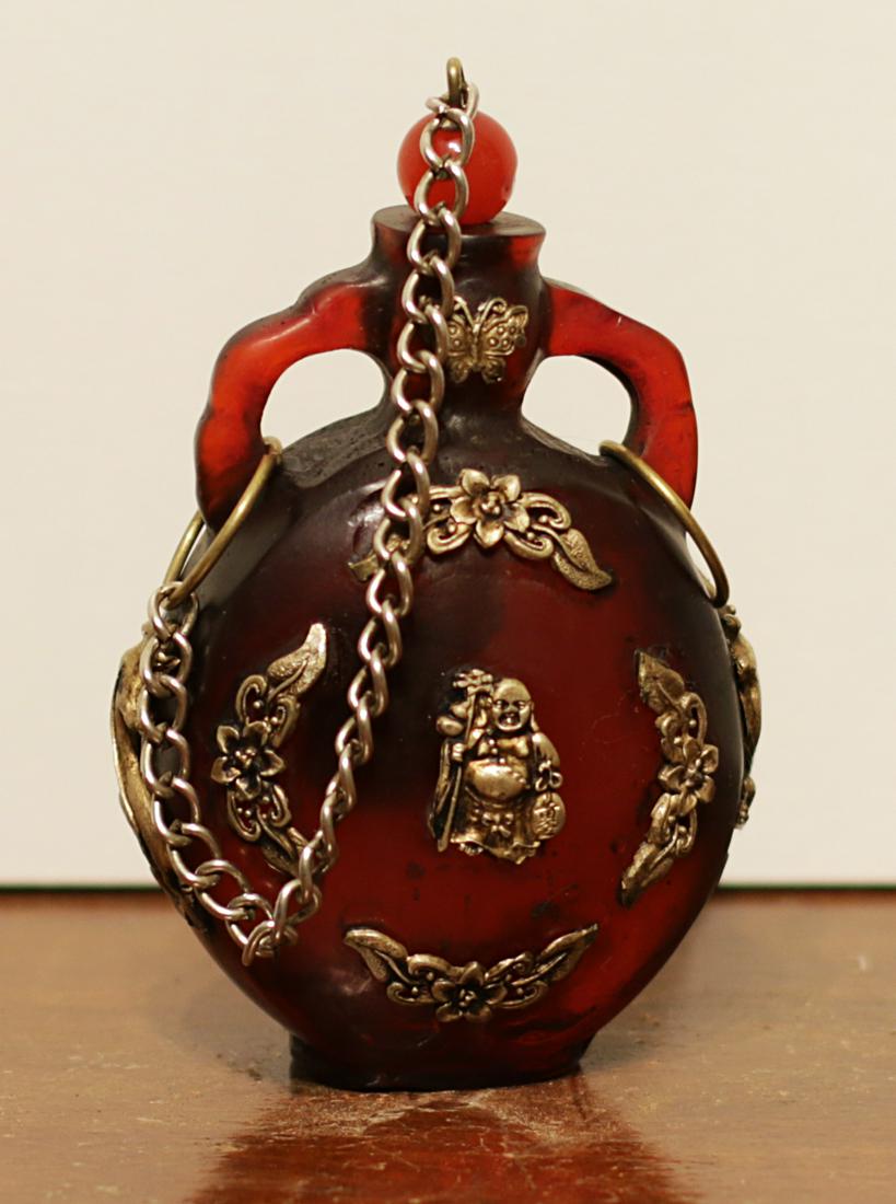 China 1950 AD Amber Glass snuff bottle. (1 of 3)