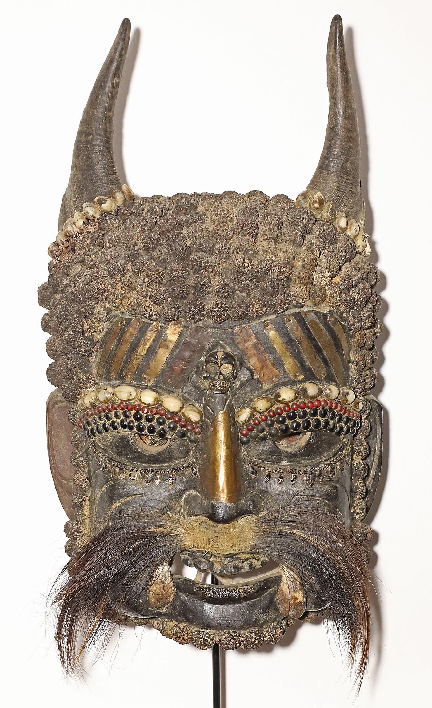 Tibet Himalayan tribes 1960 Shaman wooden mask 1.8: Tibet. Himalayan tribes. 1960/1970. Rare and impressive Shaman wooden mask. Antelopes horns. Decorated with Rudraksha seeds, shells, hardstone and metal plaque. Tooth and beard was composed by Yak fur