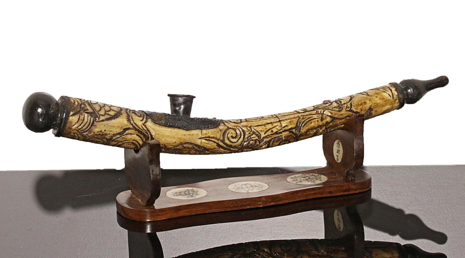China Ming Guo 1920 AD Bone opium pipe with wooden: China. Ming Guo period. 1920 AD. Bone opium pipe with wooden pedestal. Decorate with carved bone, metalwork and painting. 170 gr. - 31x3x3 cm