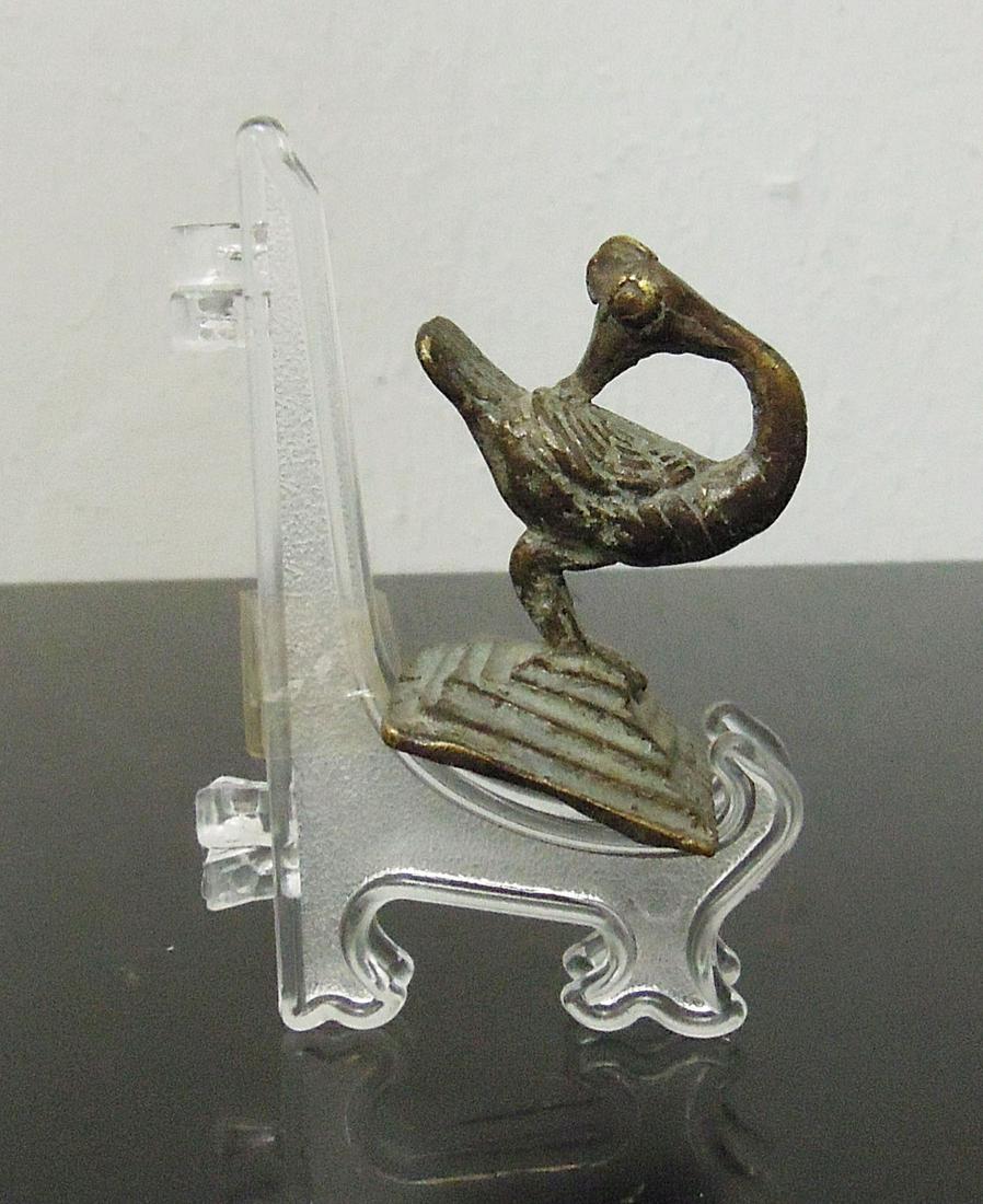 Ivory coast Ashanti People Bronze weight in bird shape: Ivory coast. Ashanti People. Bronze weight in bird shape. 114 gr. - 5,5x3,5 cm.