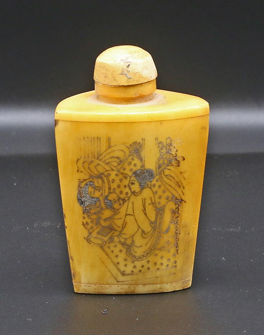 China Late Qing dynasty. 1900 Handcarved bone snuff bottle: China. Late Qing dynasty. 1900 circa. Handcarved bone snuff bottle; full decorated with erotic figures. 80 gr. - 73x42x35 mm