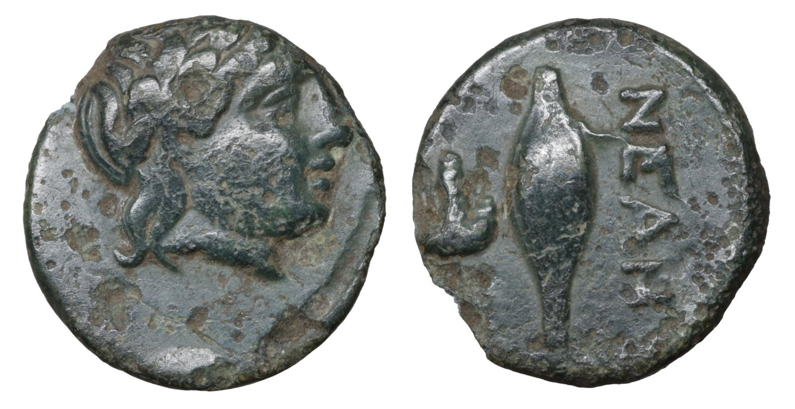 Troas Neandreia 4th Century BC Bronze: Troas. Neandreia. 4th Century BC. Bronze. 1.05 gr. â€“ 11.7 mm. O:\ Laureate head of Apollo right. R:\ Grain-ear above bunch of grapes; NEAN above. SNG Cop. 448; Klein KM -. XF