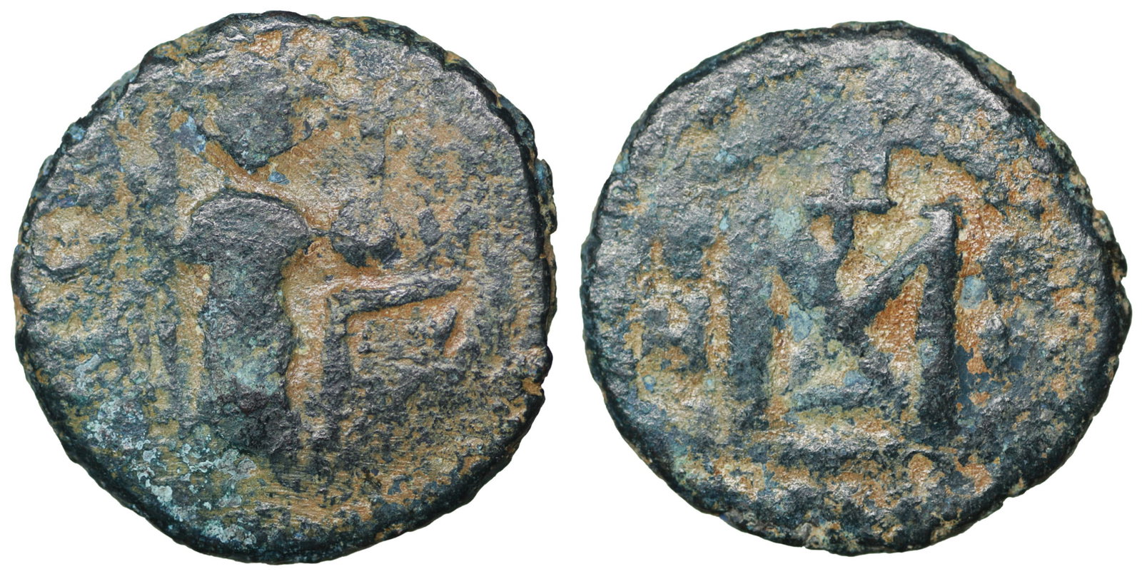 ARAB-BYZANTINE AE fals Dimashq 680-700 AD: ARAB-BYZANTINE, AE fals, Dimashq. 680-700 AD 5.82 gr. â€“ 21.1 mm . O:\ Standing imperial figure and Greek legends. R:\ Large M, DAM. Walker, 7-8; Album, 3517.1; Goodwin, 20. Rare. VF+