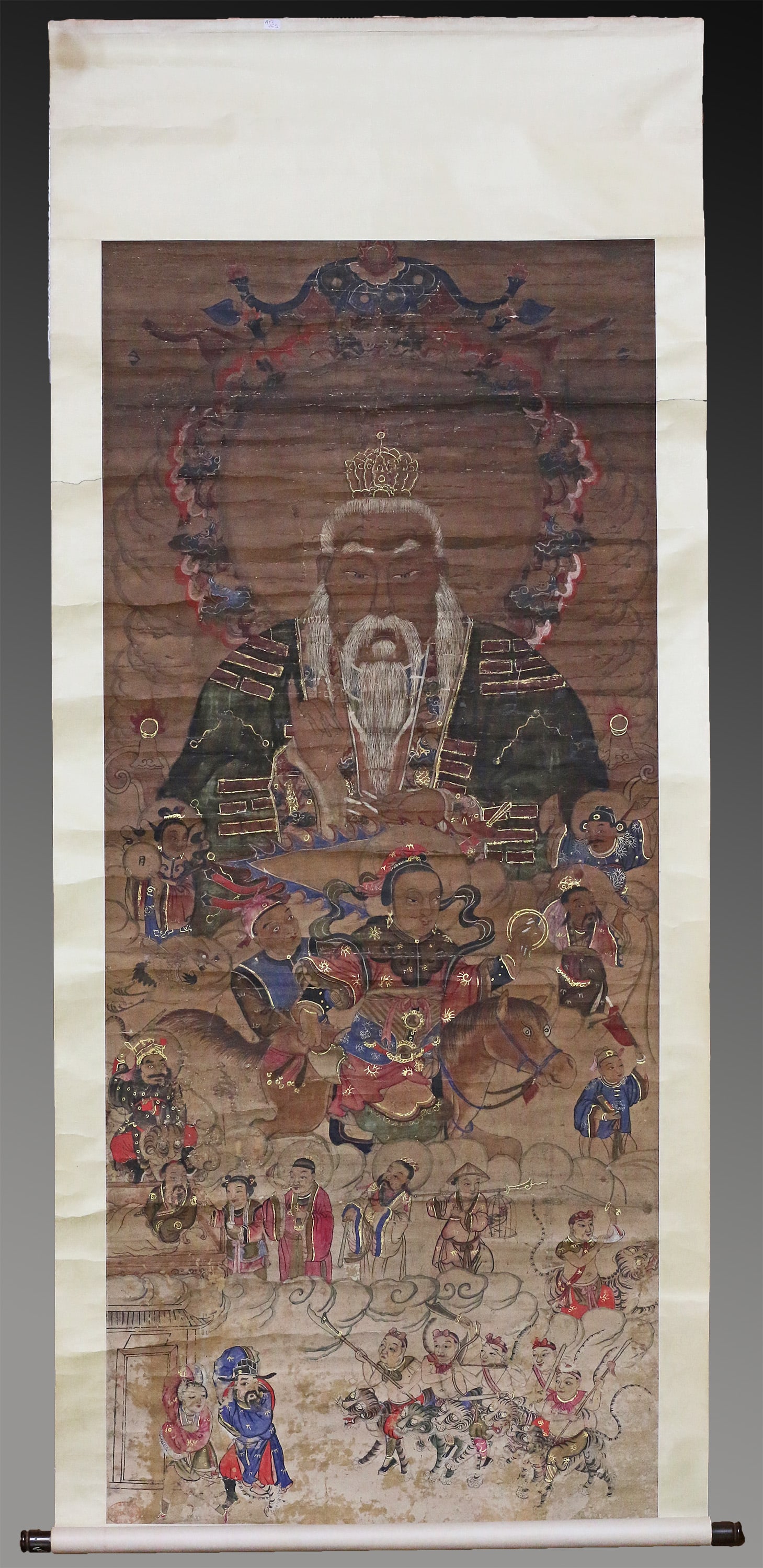 China. 1600 AD. A lovely old Chinese scroll painting (ink on silk) 144 cm: China. Late Ming - Early Qing Dynasty. 1600 AD. A lovely old Chinese scroll painting (ink on silk) with a central decoration of Wenchang Wang surrounded by horses, tigers, cranes, Buddhist treasures,