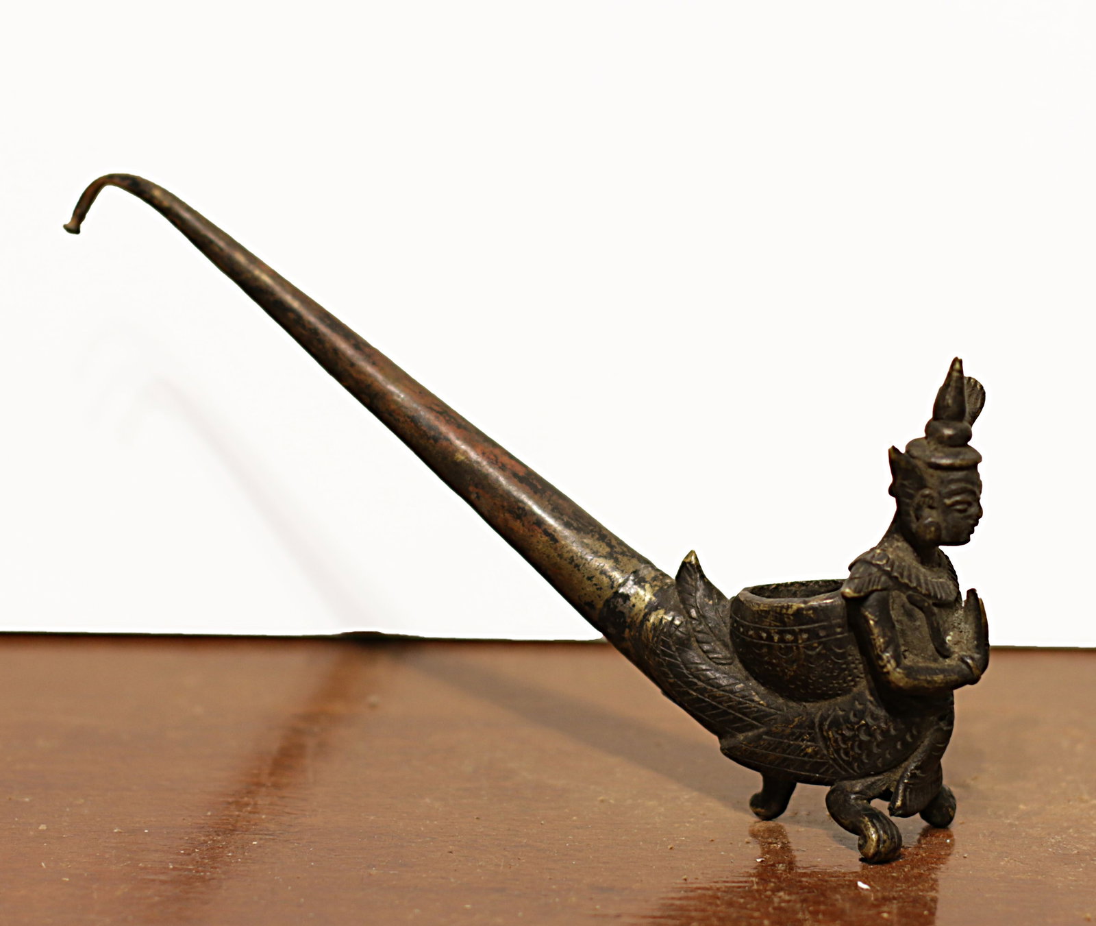 Tibet \ Nepal. 1950 AD Brass Pipe in Shiva \ Fish shape.: Tibet \ Nepal. 1950 AD. Brass Pipe in Shiva \ Fish shape. 20x8 Cm. 171 gr.