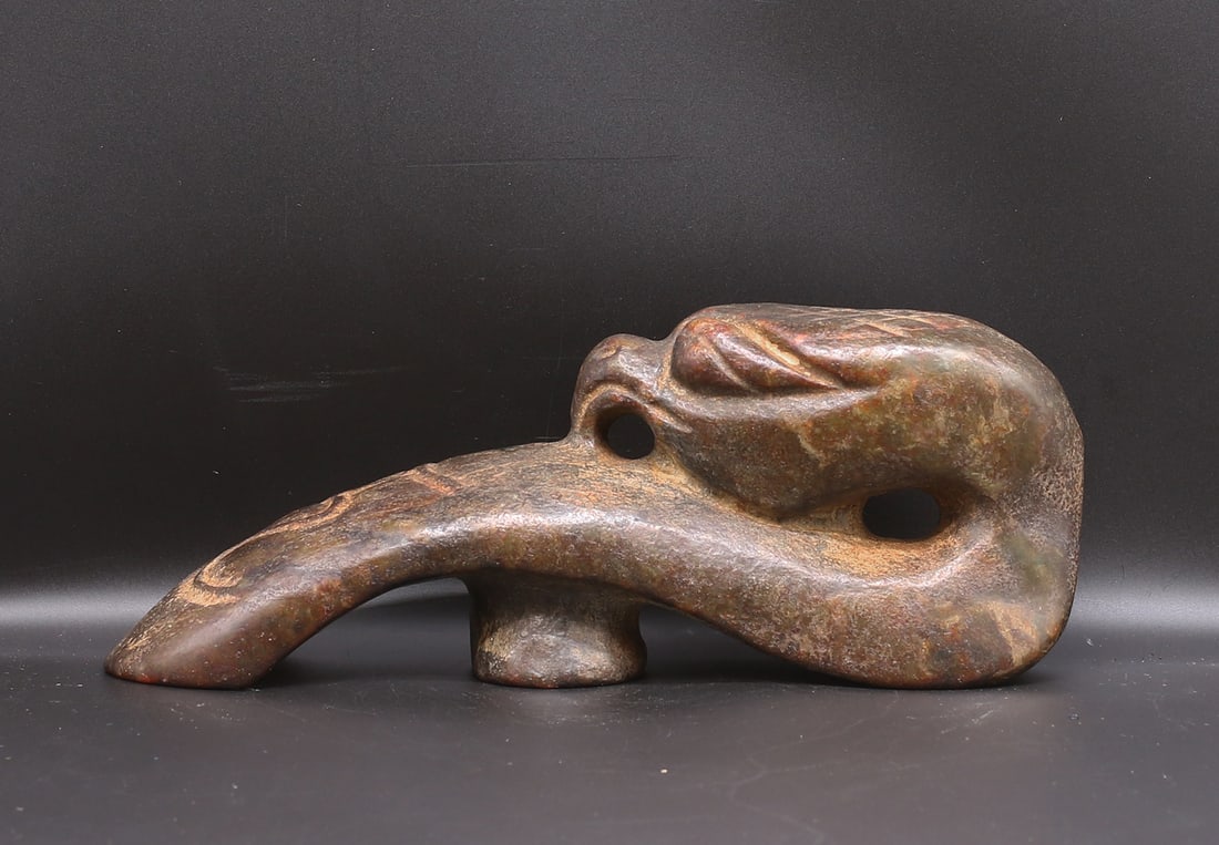 China/Mongolia 1700/1800 stone statue snake shape 1,36kg-23cm: China/Mongolia. 1700/1800. Handcarved stone statue in a snake shape with beak. 1,36 kg. - 23x9x6cm