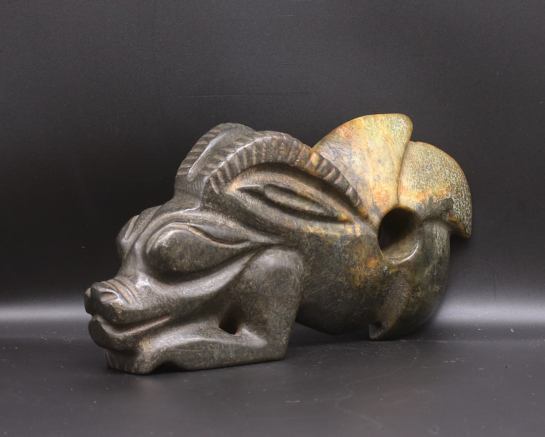 China/Mongolia 1700/1800 stone statue Fu Dog 1,46kg-23cm: China/Mongolia. 1700/1800. Handcarved stone statue in a mythological animal shape; Fu Dog with horns. 1,46kg. - 23x11x5 cm