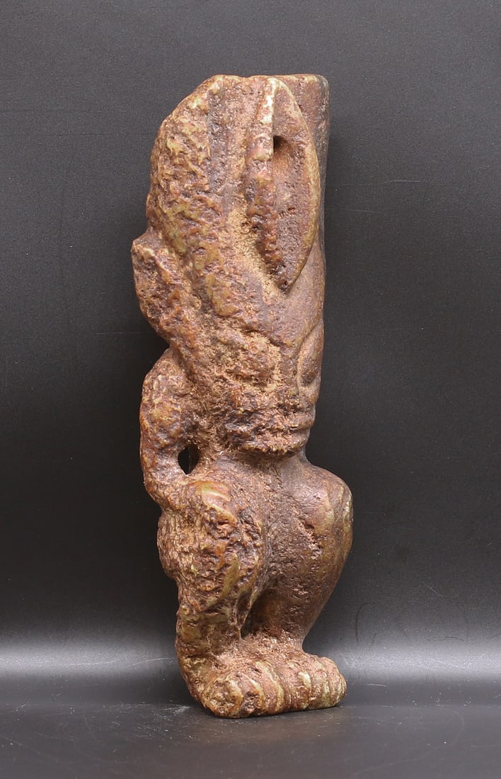 China/Mongolia 1700/1800 stone statue Hongshan style 20x7x5cm: China/Mongolia. 1700/1800. Handcarved stone statue in a seated stylized human shape. Hongshan style. 946 gr. -20x7x5cm