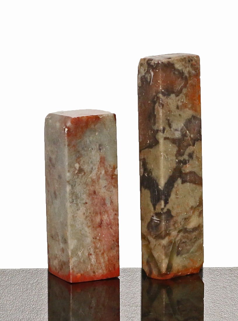 China Late Qing dynasty. 1880-1900 Lot of 2 Stone Seals: China. Late Qing dynasty. 1880-1900 circa. Lot of 2 Stone Seals. 105 gr. - 10x1,5x1,5 cm; 130 gr. - 7,5x 2,5x2,5 cm
