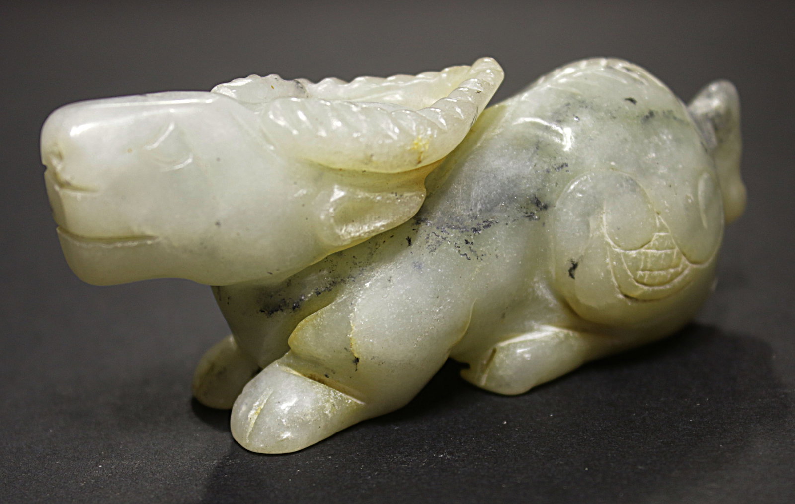 China Handcarved Fu Dog jade BeiJing 1910: China. Handcarved Fu Dog jade. BeiJing. Ming Guo period. 89 gr. - 8x3,5x2,5 cm. Extremely fine