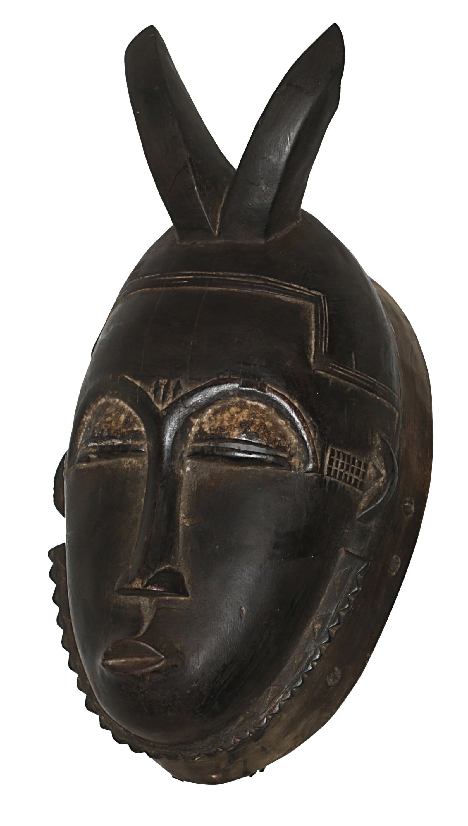 Ivory Coast Baule Ceremonial mask 1980 African Art: Ivory Coast Baule people. Ceremonial mask; two horns on top. Traces of pigmentation. 1980 circa. 977 gr. - 34x18x14 cm. Extremely fine. Rare. Provenance Fall Elhadji. The Baule are one of the Akan peo