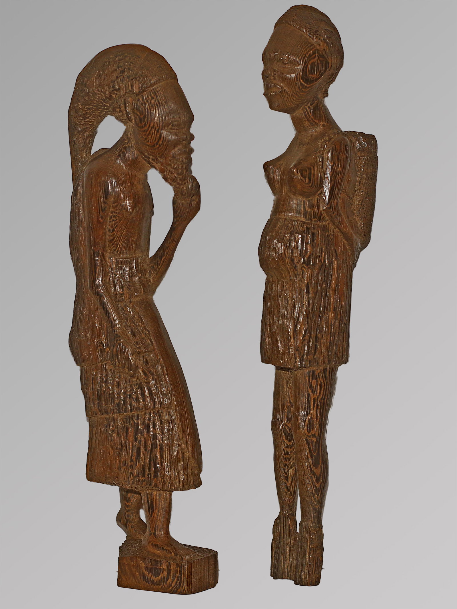 Nigeria 1960 A couple of male and female figures in baobabs wood: Nigeria. 1960 circa. A couple of male and female figures made in baobabs wood. 874 gr - 47x10x5 cm / 1,1 Kg - 44x11x5 cm