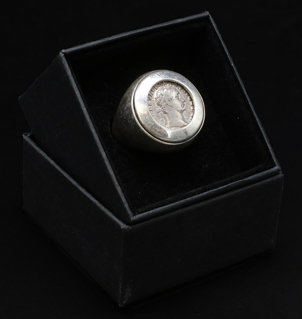 Men's silver ring with an ancient roman coin set in it TRAJAN Denarius: Men's silver ring with an ancient roman coin set in it. An extremely fine handworked unique piece done in Florence (Italy) in modern style with a touch of ancient in it: a TRAJAN Silver Denarius struc