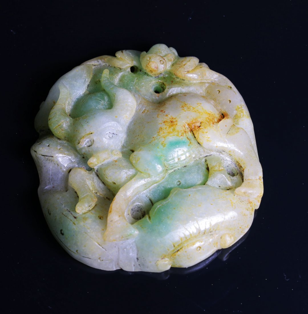 A fine Jade carved with bull celadon (1 of 3)