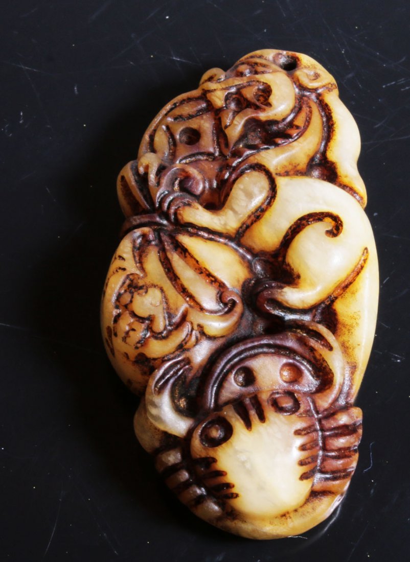 Yellow carved jade with Fu dog and crabs (1 of 2)