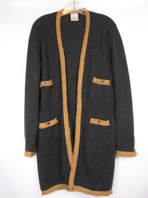 Chanel Cashmere Sweater Coat Jacket Sz 44: 100% Cashmere Chanel Sweater Coat. Open style, no fasteners. Size 44. Estimated measurements, adjustable Bust 40, waist 34, hip 40, length 36, sleeve 26. Shipping for this lot is $12.00 USA, $40.00 In