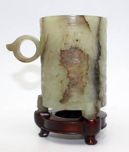 Antique Chinese Jade Cylindrical Cup on Feet: Antique Chinese Jade Cylindrical Cup on Feet on Hardwood Stand. 3 1/2" high x 2 1/4" wide.