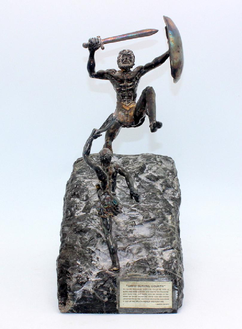 Yaacov Heller (Israeli, b.1941-) "David Slaying: Yaacov Heller (Israeli, b.1941-) "David Slaying Goliath". 10" high x 4 1/2" wide.