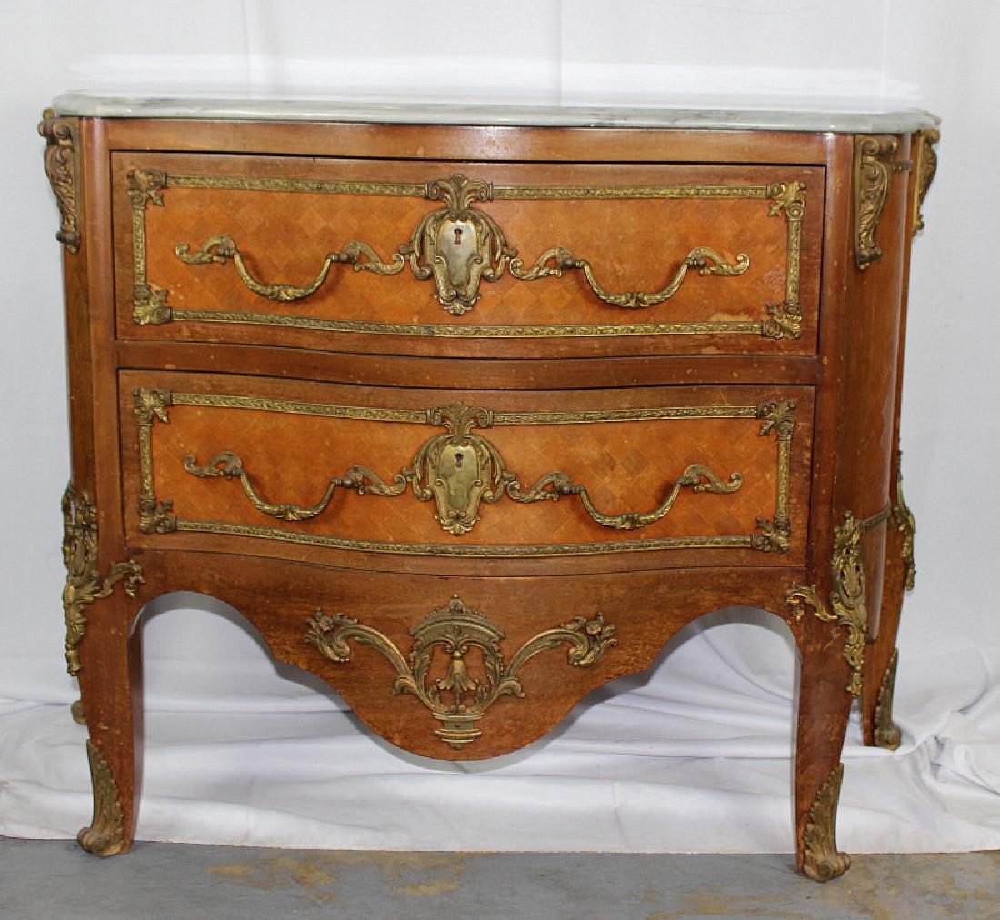 French Louis XV Style Marble Top Two Draw Commode with: French Louis XV Style Marble Top Two Draw Commode with Gilt Metal Mounts. The draw fronts & sides. Decorated with parquetry. 33" high x 44" wide.