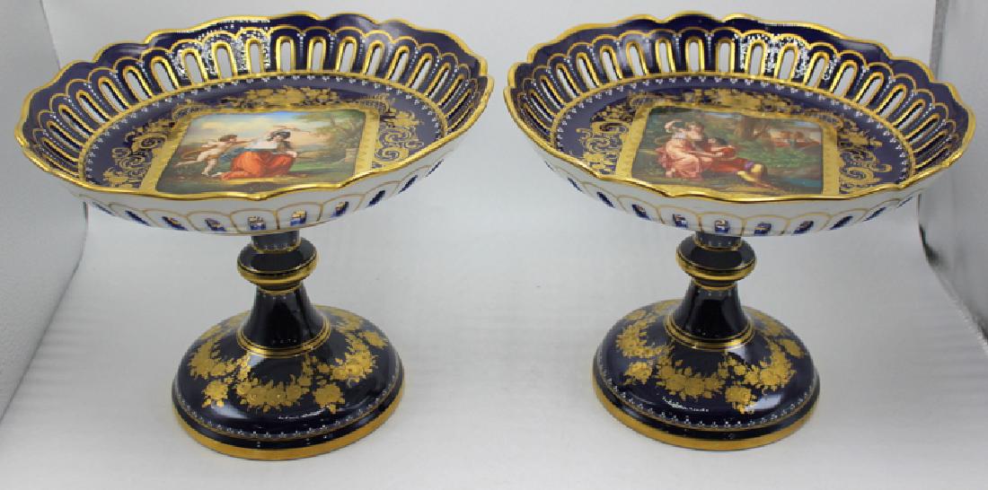 Pair of Royal Vienna Compotes "Rinaldo & Armida" &: Pair of Royal Vienna Compotes "Rinaldo & Armida" & "Venus & Amore". Hairline to underside of one. 7 1/2" high x 10" wide.
