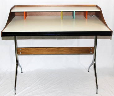 Nelson™ for Herman Miller® Swag Leg Desk: Nelson™ for Herman Miller Swag Leg Desk. 39" w x 28.5" d x 34.5" h. Made by Herman Miller® 1958 walnut, laminate top, plastic drawers, chromed steel tubing. Comes with certificate of authenticity.