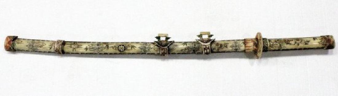 Chinese Carved Polychrome Bone Sword: Chinese Carved Polychrome Bone Sword. 32" long with case, 28" long without case.