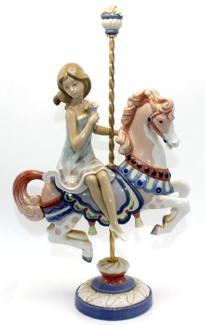 Lladro #1469 Girl on Carousel Horse: Lladro #1469 Girl on Carousel Horse. Designed by Jose Puche, 15" h x 9" w. SOLD AS IS.