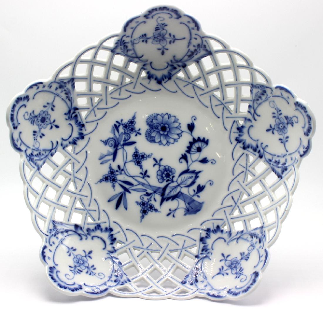 Meissen "Blue Onion" Compote: Meissen "Blue Onion" Compote with a reticulated bowl and swirled base. Marked "blue crossed sword mark.9" h x 10 1/2" diameter.