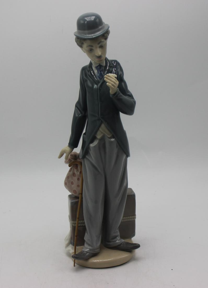 Lladro porcelain #5233: Lladro porcelain #5233. Charlie and the tramp. 11"H
