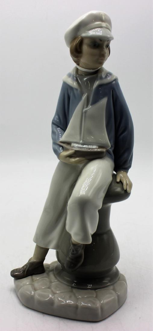 Lladro #4810 Boy with yacht (1 of 1)